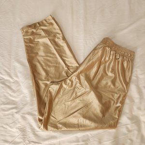 Gold Nike snap side basketball pants